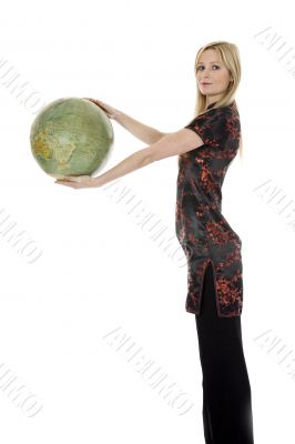 Young woman with  globe