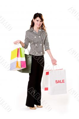 young woman full of shopping bags