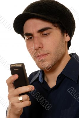 Young man texting on mobile phone