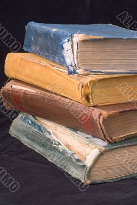 Old books and magnifier