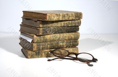 antique books and glasses