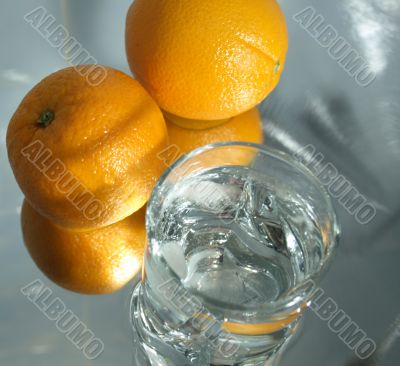 Glass of water and fruits