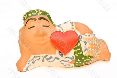 Ceramic figure of east young man with the big red heart