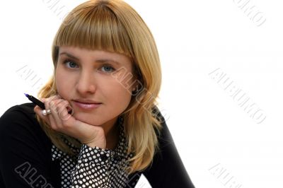 young woman with pen in office