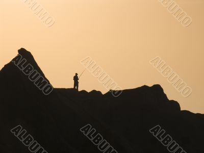 Silhouette of the fisherman