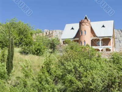 Stone cottage in mountains
