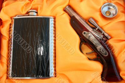 Pistol and flask