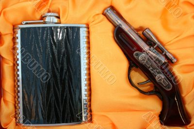 Pistol and flask
