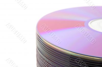 Close-up of stacked purple DVDs