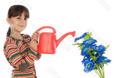 Girl watering flowers