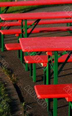 red summer party tables and red chairs