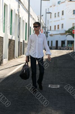 Man on the street in summer city