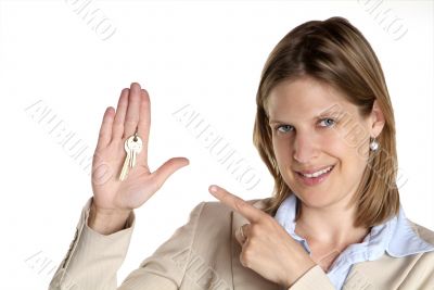 woman shows key