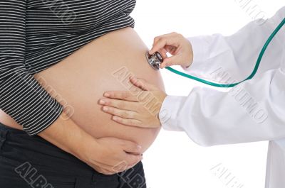 Pregnant examined by a doctor