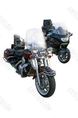Two greater black motorcycles.
