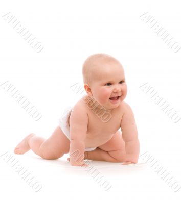 Funny little girl lying on white bed over white background