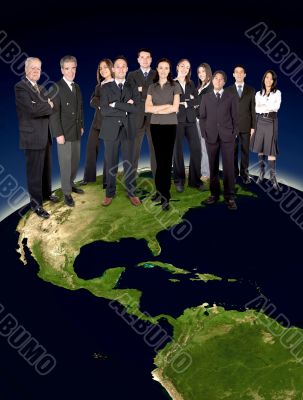 business team on top of the world
