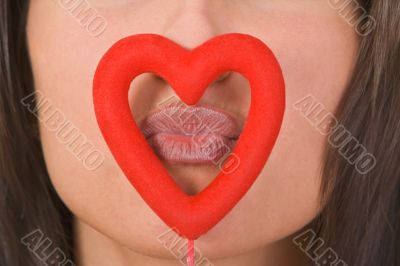 Kissing through the heart