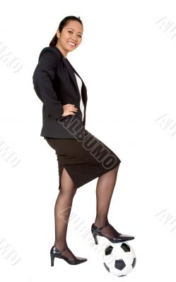 confident asian business woman with football