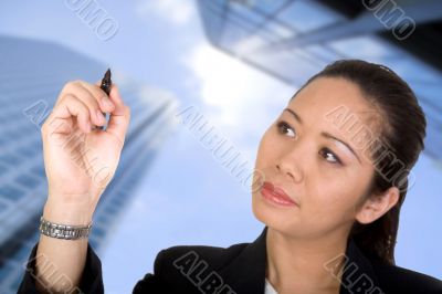asian business woman writing on screen