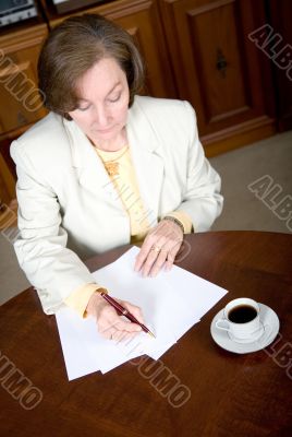 business woman writing a letter