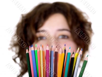 beautiful girl holding color pencils
