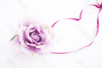 violet artificial rose convoluted in purple tape 2