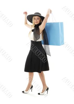 blond in retro hat with blue shopping bag 2