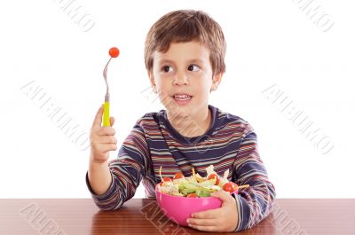 Child eating salad