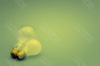 Background with lit lightbulb