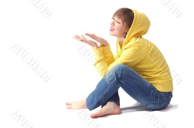 girl siting and looking on the her open palm