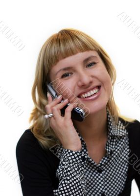 young woman with mobile phone is smiling in office
