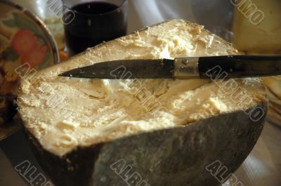 Cheese, knife, red wine