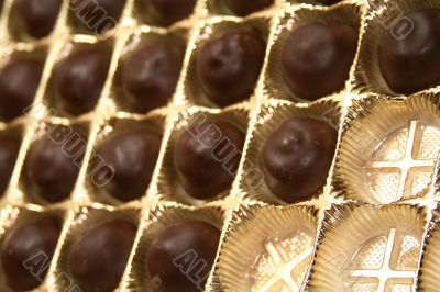 Golden box with chocolates