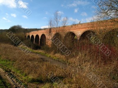 abandoned bridge with arches