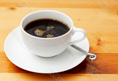 Closeup of black coffee in white cup