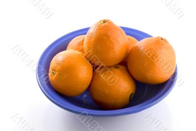 Oranges in blue bowl
