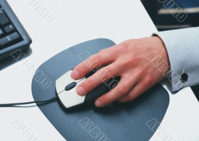computer mouse in hand