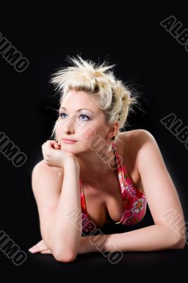caucasian girl leaning one one hand look side way