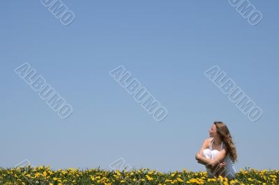 Young woman enjoying fresh air and sun