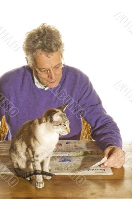 senior man is reading newspaper