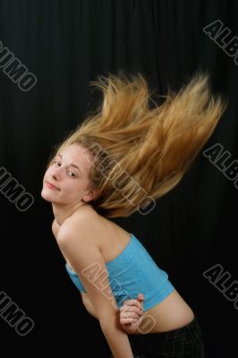 young girl  with fluing  hair