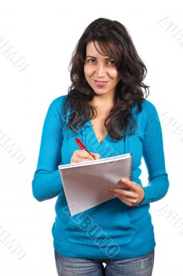 Young student woman writing