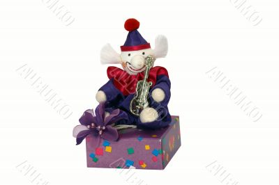 Clown sitting on a box