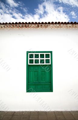 colonial architecture wall with a window