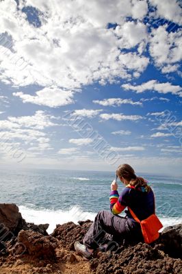 pensive woman by the sea