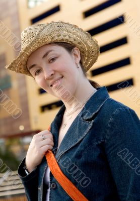 beautiful girl outdoors wearing a hat