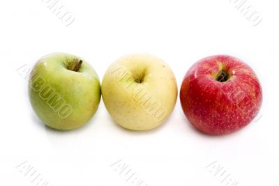 three apples of different colours