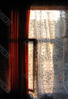 Curtains on a sunset.