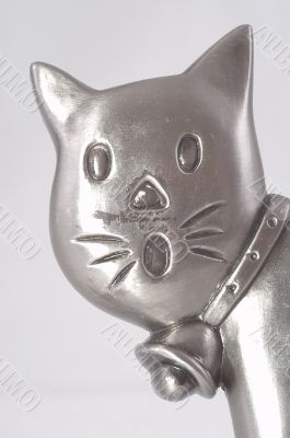 Head of a metal toy cat